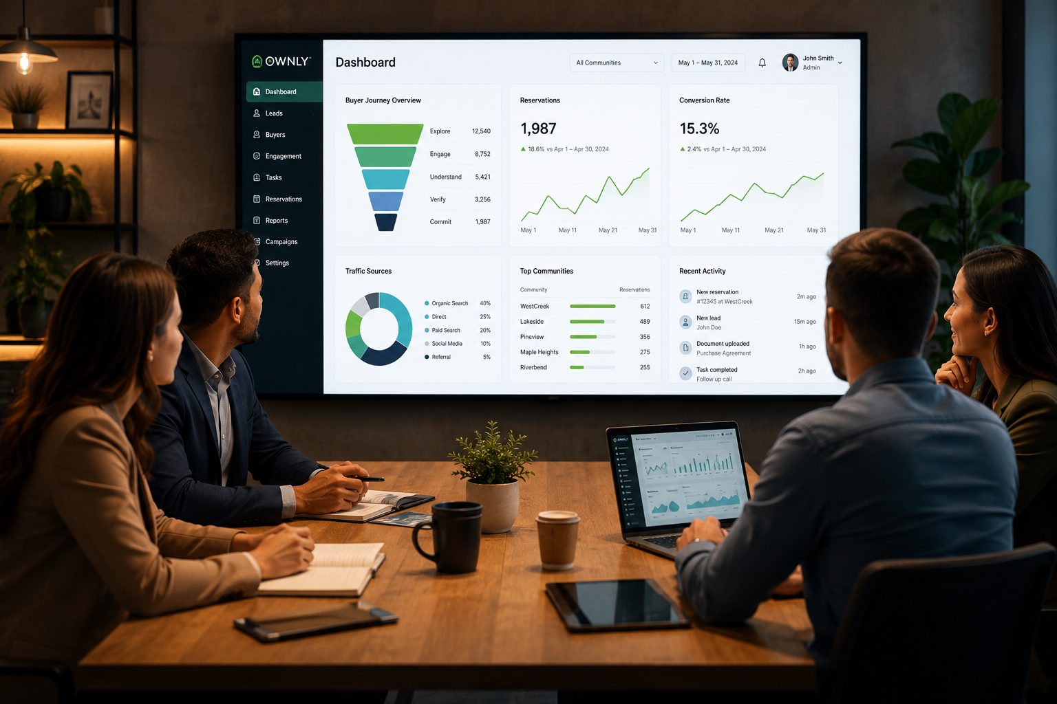 A sales consultant meeting with a homebuyer